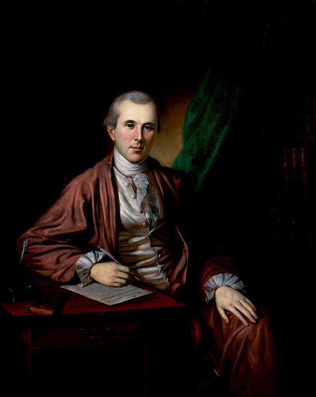 A portrait of a seated person in 18th-century attire with a book, desk, and quill, possibly a scholar or writer, against a dark backdrop with bookshelves.